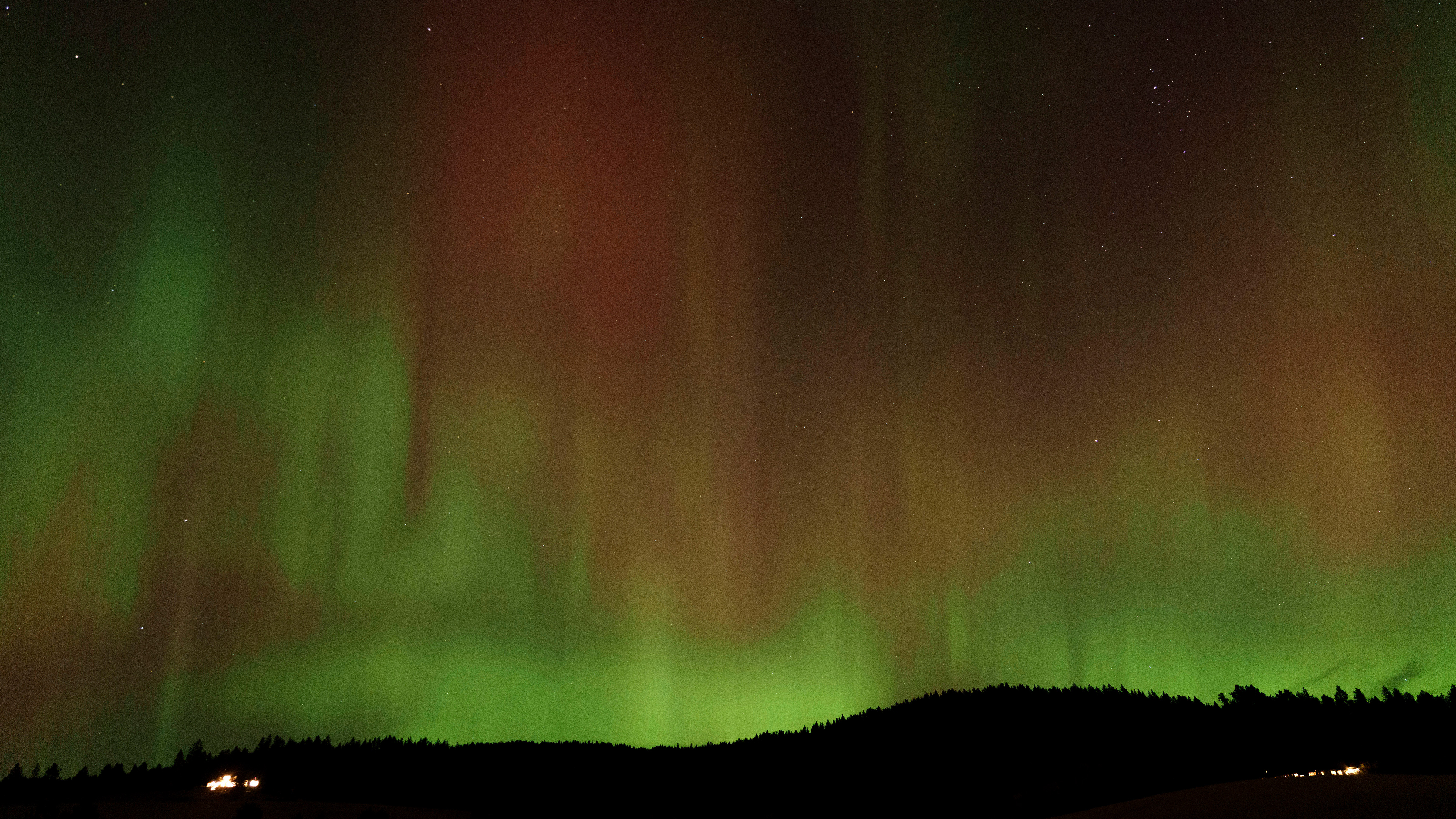 An aurora borealis, also known as the northern lights, is seen in the night sky on Thursday, Oct. 10, 2024, in Moscow, Idaho. 